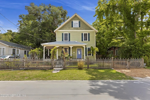 73 Weeden St, Saint Augustine, FL 32084 - view of front of home with a porch and a fenced front yard