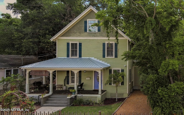 73 Weeden St, Saint Augustine, FL 32084 - view of front of home with a porch