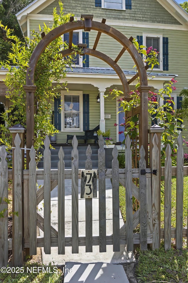 73 Weeden St, Saint Augustine, FL 32084 - exterior space featuring a porch and a fenced front yard