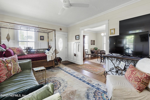 73 Weeden St, Saint Augustine, FL 32084 - living area with a wealth of natural light, ornamental molding, a ceiling fan, and wood finished floors
