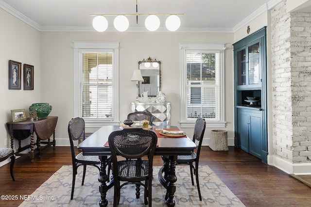 73 Weeden St, Saint Augustine, FL 32084 - dining space featuring a wealth of natural light, dark wood-style flooring, and crown molding