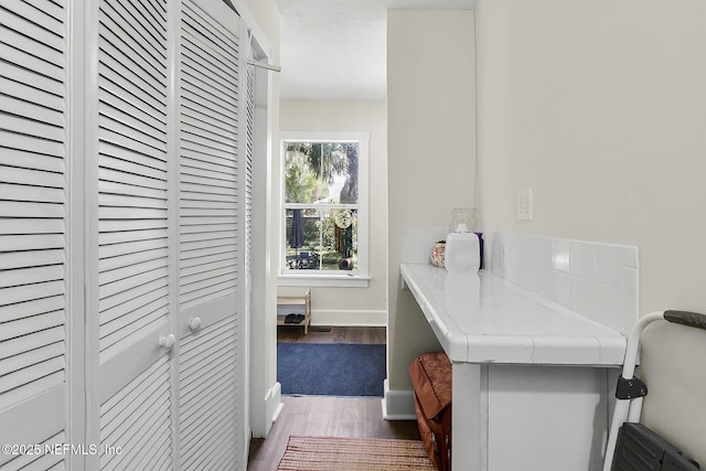 73 Weeden St, Saint Augustine, FL 32084 - bathroom featuring wood finished floors and baseboards