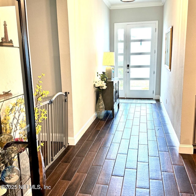 273 Caribbean Pl, Saint Johns, FL 32259 - entryway featuring wood finish floors, crown molding, and baseboards