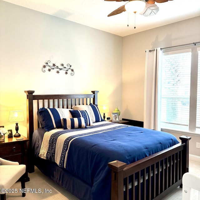 273 Caribbean Pl, Saint Johns, FL 32259 - carpeted bedroom with multiple windows, baseboards, and ceiling fan
