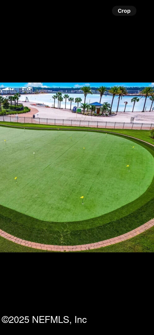 273 Caribbean Pl, Saint Johns, FL 32259 - view of community featuring a putting green and fence