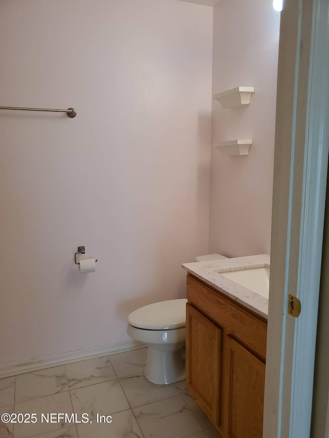 3429 Steelgate Ct, Middleburg, FL 32068 - half bath with toilet, marble finish floor, baseboards, and vanity