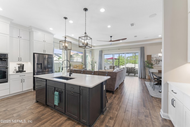380 Maralinda Dr, Saint Augustine, FL 32095 - kitchen featuring light countertops, a sink, white cabinets, and recessed lighting