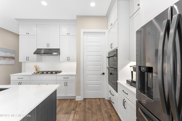 380 Maralinda Dr, Saint Augustine, FL 32095 - kitchen featuring recessed lighting, under cabinet range hood, dark wood-style flooring, stainless steel appliances, and backsplash