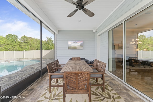 380 Maralinda Dr, Saint Augustine, FL 32095 - sunroom / solarium featuring outdoor dining space and ceiling fan with notable chandelier