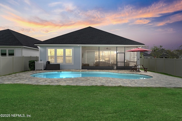 380 Maralinda Dr, Saint Augustine, FL 32095 - back of house with a yard, a fenced backyard, a fenced in pool, and a sunroom