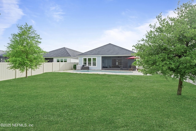 380 Maralinda Dr, Saint Augustine, FL 32095 - rear view of house with a sunroom, a yard, a fenced backyard, a patio, and a fenced in pool