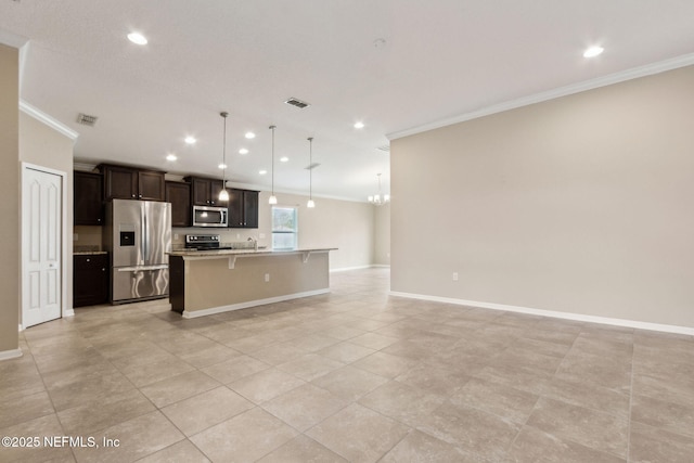 95210 Leafcrest Ct, Fernandina Beach, FL 32034 - kitchen with visible vents, ornamental molding, a kitchen island with sink, appliances with stainless steel finishes, and open floor plan