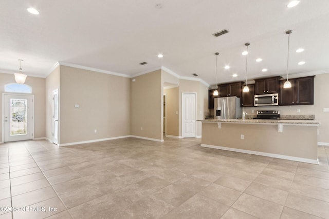 95210 Leafcrest Ct, Fernandina Beach, FL 32034 - kitchen featuring recessed lighting, stainless steel appliances, visible vents, crown molding, and a center island with sink