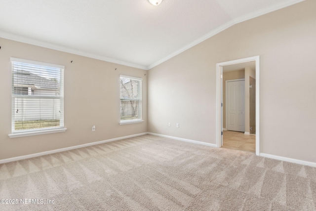95210 Leafcrest Ct, Fernandina Beach, FL 32034 - unfurnished room with vaulted ceiling, baseboards, carpet floors, and ornamental molding