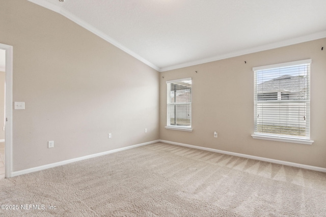 95210 Leafcrest Ct, Fernandina Beach, FL 32034 - carpeted empty room with lofted ceiling, baseboards, and ornamental molding