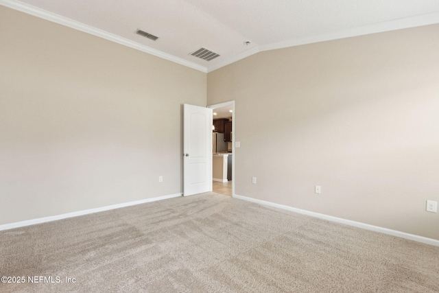 95210 Leafcrest Ct, Fernandina Beach, FL 32034 - spare room with light carpet, baseboards, visible vents, lofted ceiling, and ornamental molding