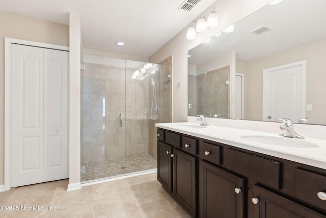 95210 Leafcrest Ct, Fernandina Beach, FL 32034 - full bath with visible vents, a sink, and a stall shower