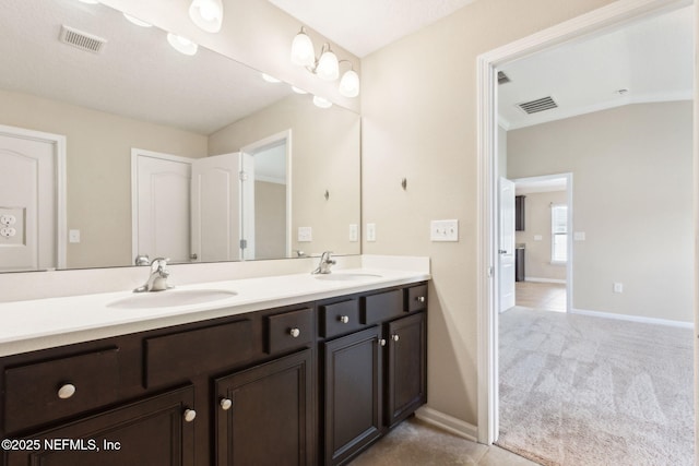 95210 Leafcrest Ct, Fernandina Beach, FL 32034 - bathroom featuring double vanity, visible vents, and a sink