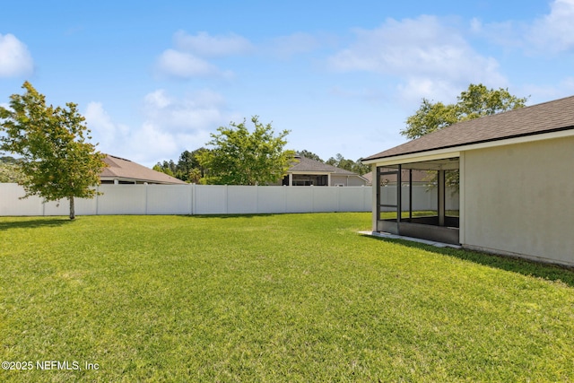 95210 Leafcrest Ct, Fernandina Beach, FL 32034 - view of yard featuring a fenced backyard and a sunroom