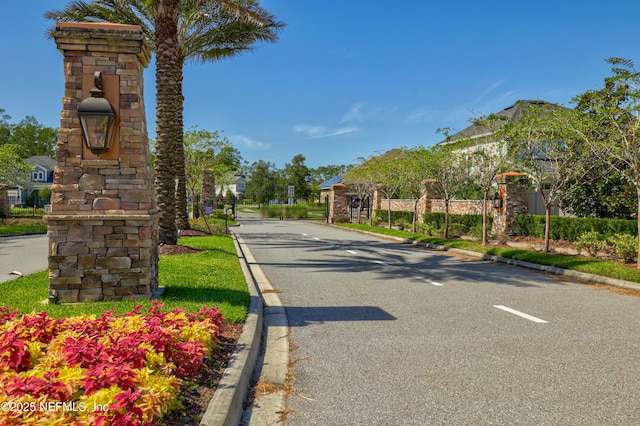 121 Oxford Estates Way, Saint Johns, FL 32259 - view of road featuring curbs, a gated entry, and a residential view