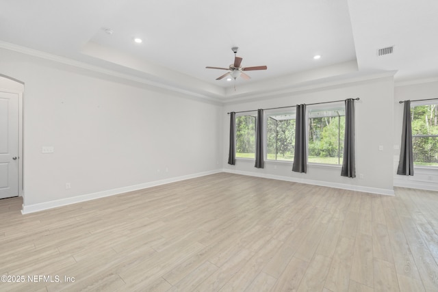 121 Oxford Estates Way, Saint Johns, FL 32259 - empty room with visible vents, a raised ceiling, ceiling fan, and light wood finished floors