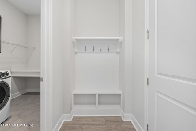 121 Oxford Estates Way, Saint Johns, FL 32259 - mudroom featuring baseboards, washer / clothes dryer, and wood finished floors
