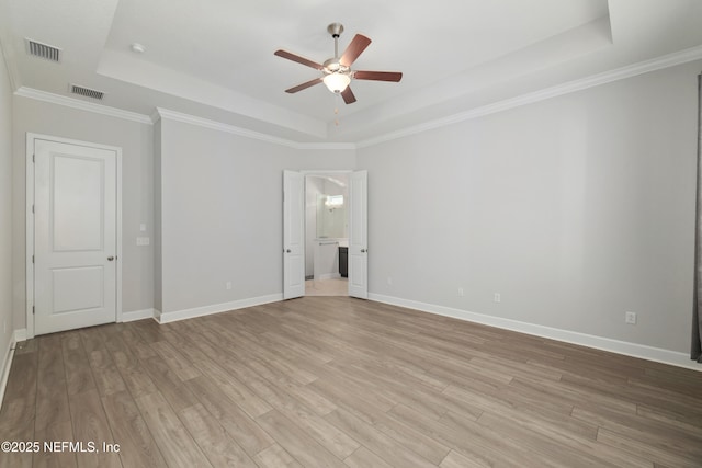 121 Oxford Estates Way, Saint Johns, FL 32259 - unfurnished room featuring visible vents, a ceiling fan, and a tray ceiling