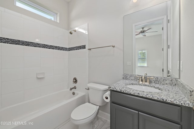 121 Oxford Estates Way, Saint Johns, FL 32259 - full bath featuring toilet, vanity, baseboards, washtub / shower combination, and a ceiling fan