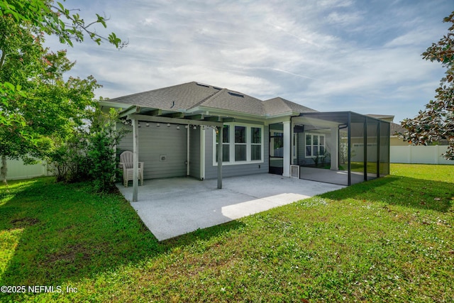 121 Oxford Estates Way, Saint Johns, FL 32259 - back of house with a patio, a yard, a shingled roof, and fence