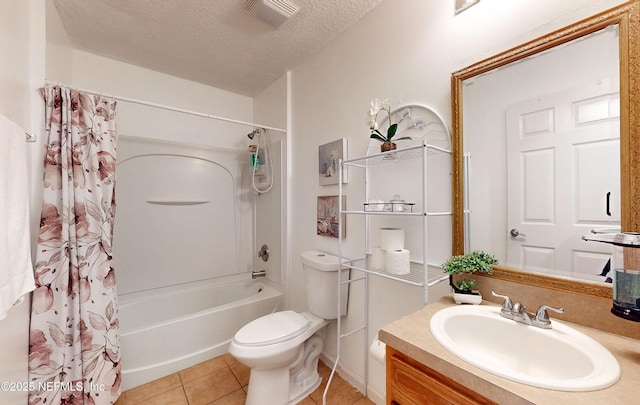 8413 Free Ave, Jacksonville, FL 32211 - bathroom featuring vanity, tile patterned flooring, shower / tub combo with curtain, a textured ceiling, and toilet