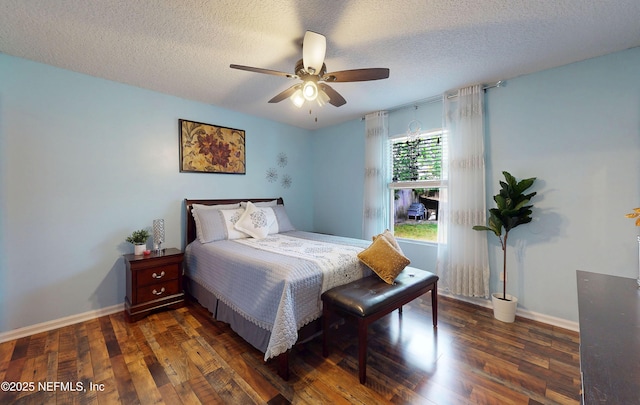 8413 Free Ave, Jacksonville, FL 32211 - bedroom featuring dark wood-type flooring, baseboards, and a ceiling fan