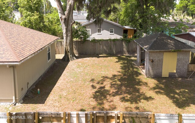 8413 Free Ave, Jacksonville, FL 32211 - view of yard featuring an outbuilding and fence private yard