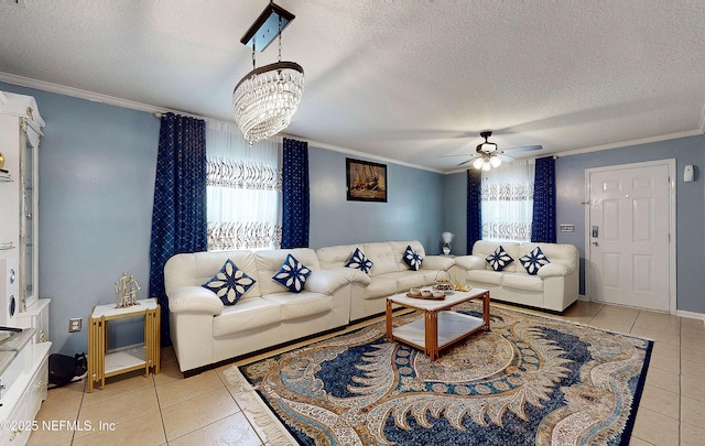 8413 Free Ave, Jacksonville, FL 32211 - living room featuring ornamental molding, ceiling fan with notable chandelier, light tile patterned floors, and a textured ceiling