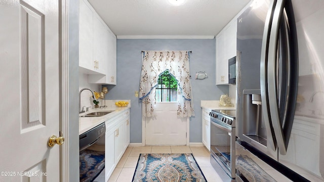 8413 Free Ave, Jacksonville, FL 32211 - kitchen featuring crown molding, light tile patterned floors, white cabinets, black appliances, and a sink