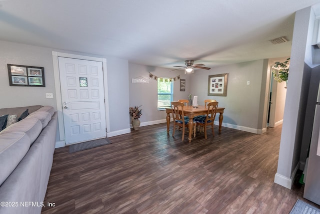 dining area with ceiling fan, baseboards, dark wood-style floors, and visible vents