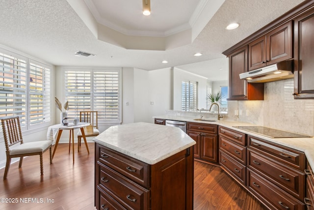 210 N Serenata Dr Unit 521, Ponte Vedra Beach, FL 32082 - kitchen featuring crown molding, black electric stovetop, a sink, under cabinet range hood, and visible vents