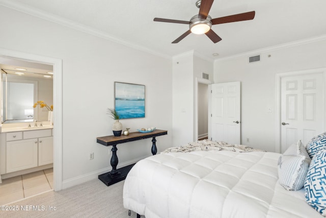 210 N Serenata Dr Unit 521, Ponte Vedra Beach, FL 32082 - bedroom featuring crown molding, a sink, baseboards, ensuite bathroom, and visible vents