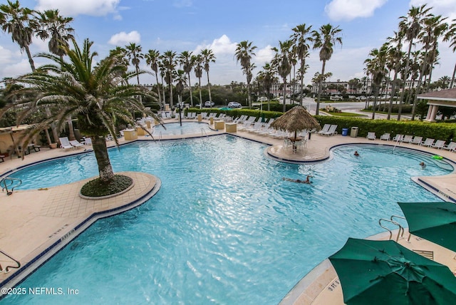 210 N Serenata Dr Unit 521, Ponte Vedra Beach, FL 32082 - community pool with a patio area
