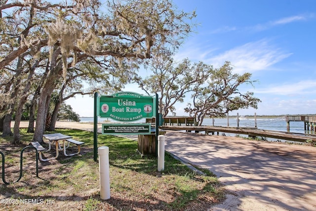 210 N Serenata Dr Unit 521, Ponte Vedra Beach, FL 32082 - view of property's community featuring a water view and a dock