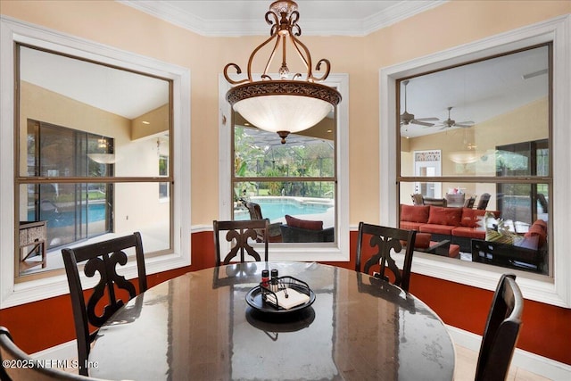 15 Dartmouth Trce, Ormond Beach, FL 32174 - dining area featuring ceiling fan and crown molding