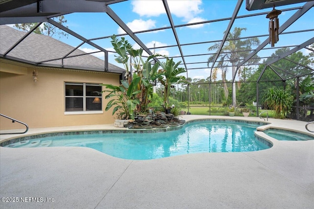 15 Dartmouth Trce, Ormond Beach, FL 32174 - view of swimming pool with a patio, glass enclosure, and a pool with connected hot tub