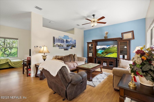 15 Dartmouth Trce, Ormond Beach, FL 32174 - living room with visible vents, ceiling fan, and light wood-style flooring