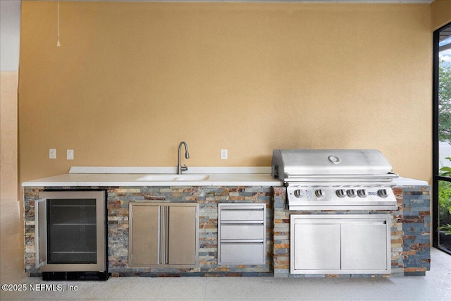 15 Dartmouth Trce, Ormond Beach, FL 32174 - view of patio / terrace with area for grilling, grilling area, wine cooler, and a sink