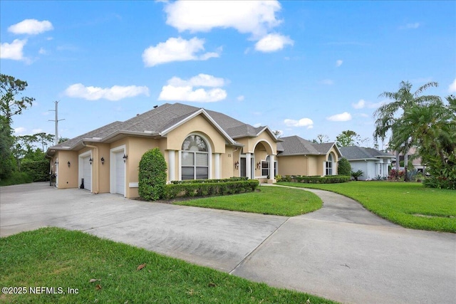 15 Dartmouth Trce, Ormond Beach, FL 32174 - ranch-style home with stucco siding, a front yard, concrete driveway, and an attached garage
