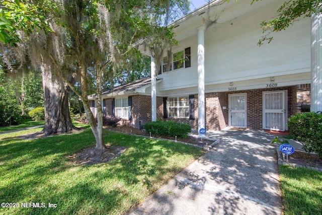 9252 San Jose Blvd Unit 3603, Jacksonville, FL 32257 - multi unit property with brick siding and a front lawn