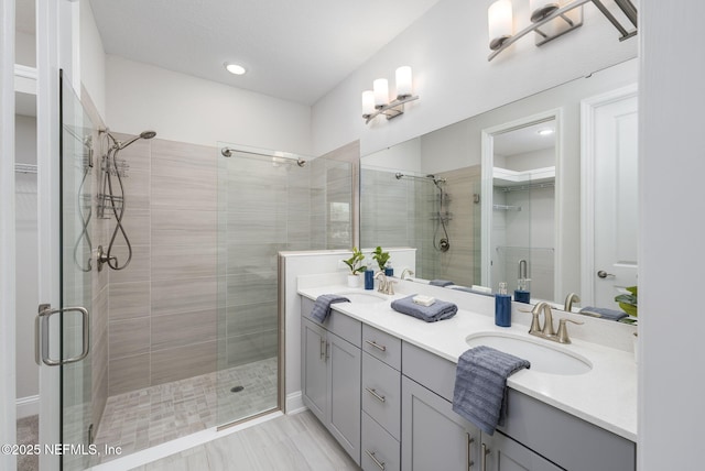 130 Juniper Hills Dr, Saint Johns, FL 32259 - full bathroom with a shower stall, double vanity, a spacious closet, and recessed lighting