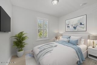 160 Ronald Rd, Saint Augustine, FL 32095 - bedroom featuring wood finished floors and baseboards