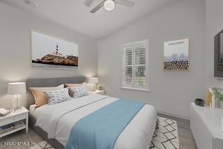 160 Ronald Rd, Saint Augustine, FL 32095 - bedroom with vaulted ceiling and ceiling fan