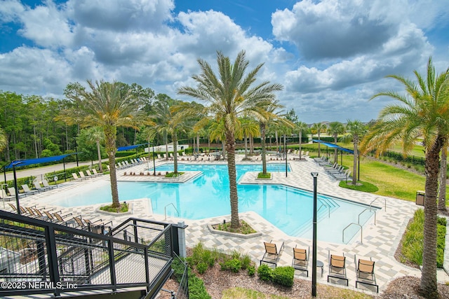 pool featuring a patio area