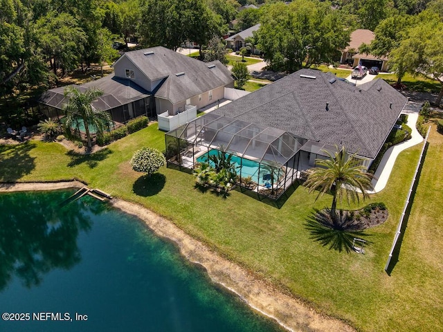 drone / aerial view with a water view